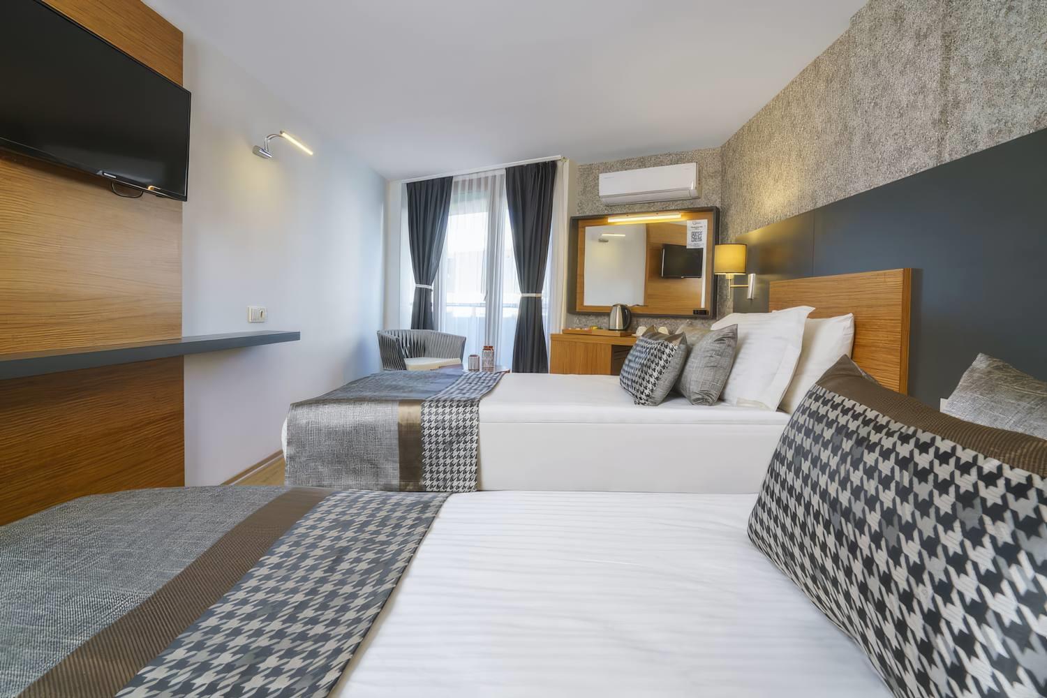 Qinn Hotels Rezervasyon