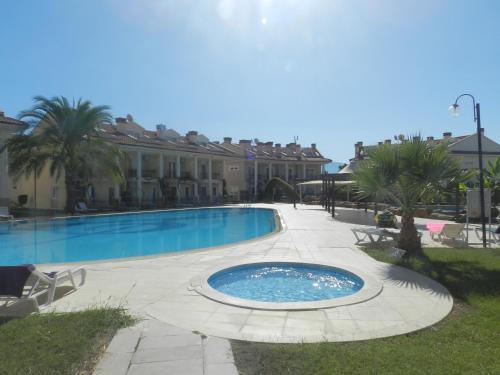 Oasis Holiday Residence & Villas Rezervasyon