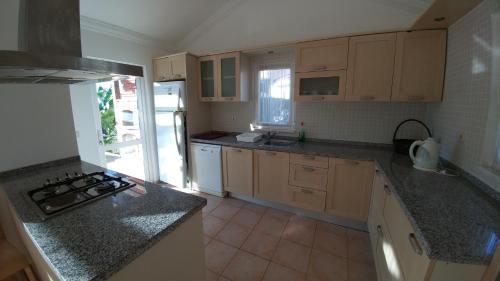 Oasis Holiday Residence & Villas Rezervasyon